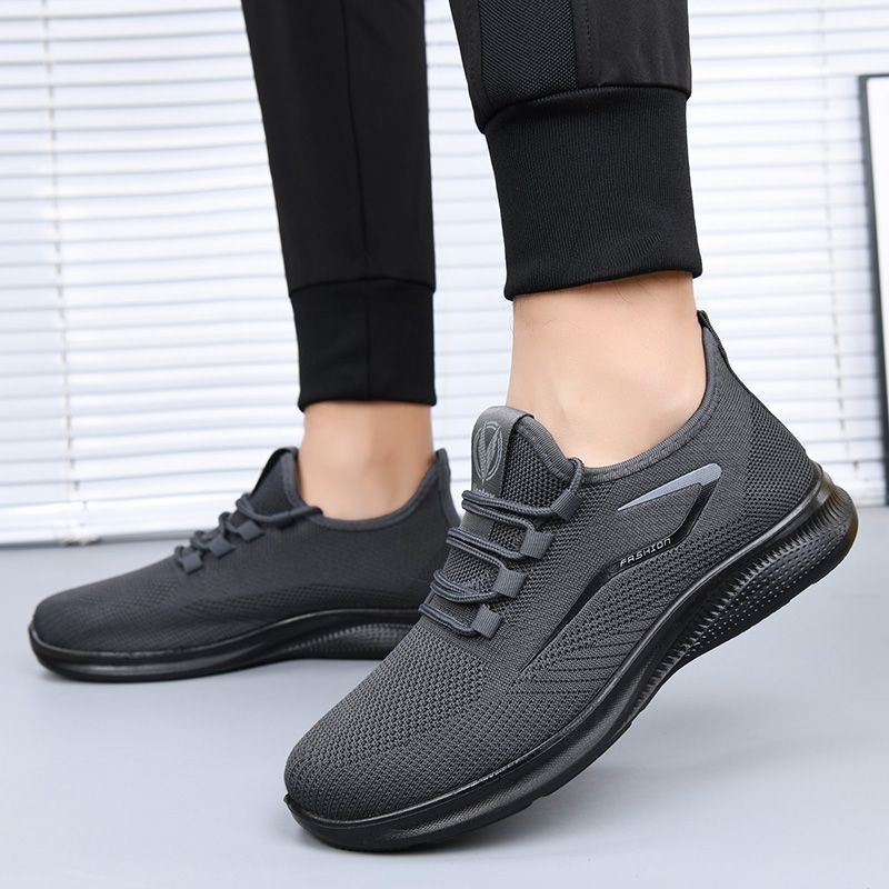 Zapatos de hombre de tamaño grande transfronterizo primavera y otoño nuevos zapatos ligeros de suela suave zapatos de malla cómodos zapatos deportivos casuales al aire libre