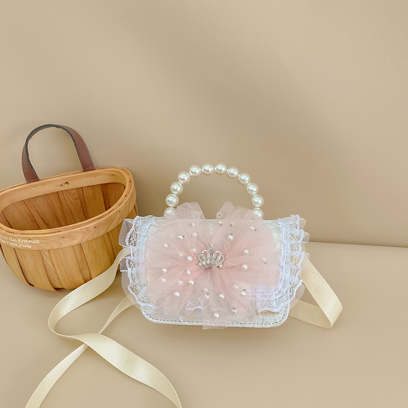 Bolsa de niños de estilo extranjero bolso de perlas bolso de hombro de encaje arco lindos princesa mochila