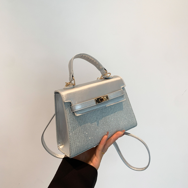 Bolsa pequeña de estilo extranjero para mujeres 2024 nuevo estilo de mano popular coreana de hombro de un solo hombro para viajar sensación de alta calidad bolso Kylie