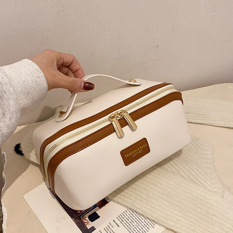 跨境热款高级感手提化妆包PU随身便携洗漱包出差百搭护肤品收纳包