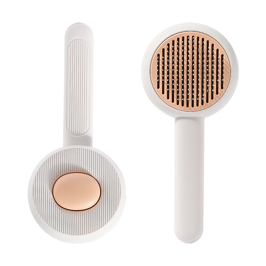 Nuevo peine de mascotas gato acero inoxidable pin de masaje de acero flotante cepillo de depilación de un botón pein de depilación de perros