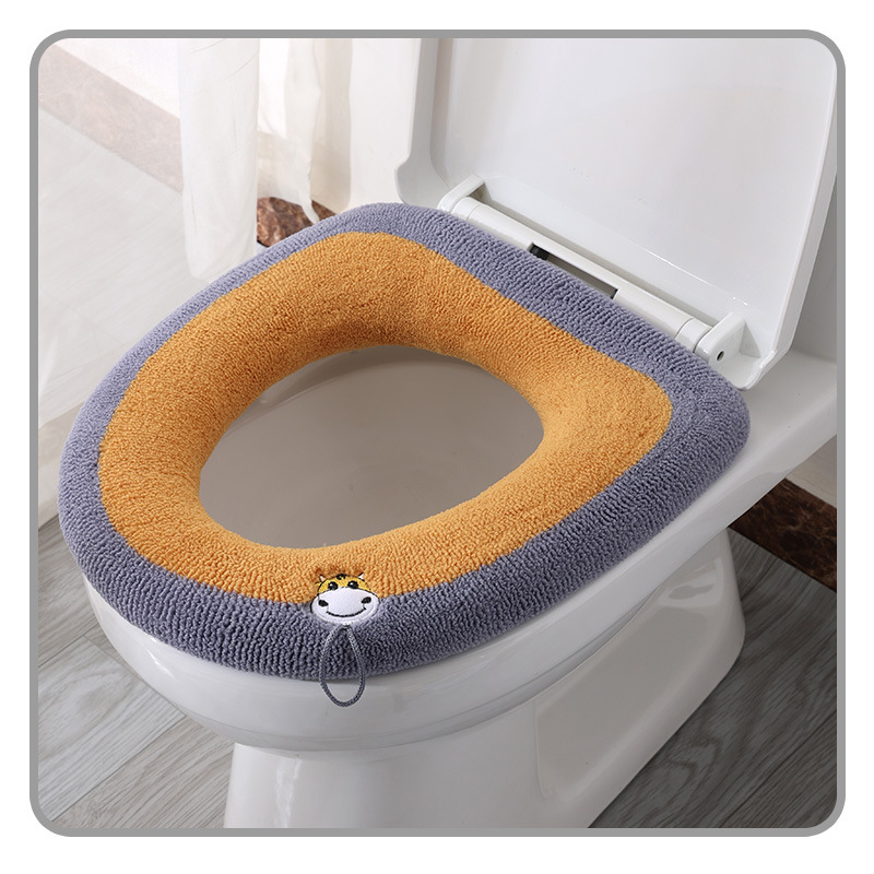 Cubierta de inodoro de punto engrosada cojín del asiento del inodoro cuatro estaciones mango Universal asiento del inodoro hogar al por mayor