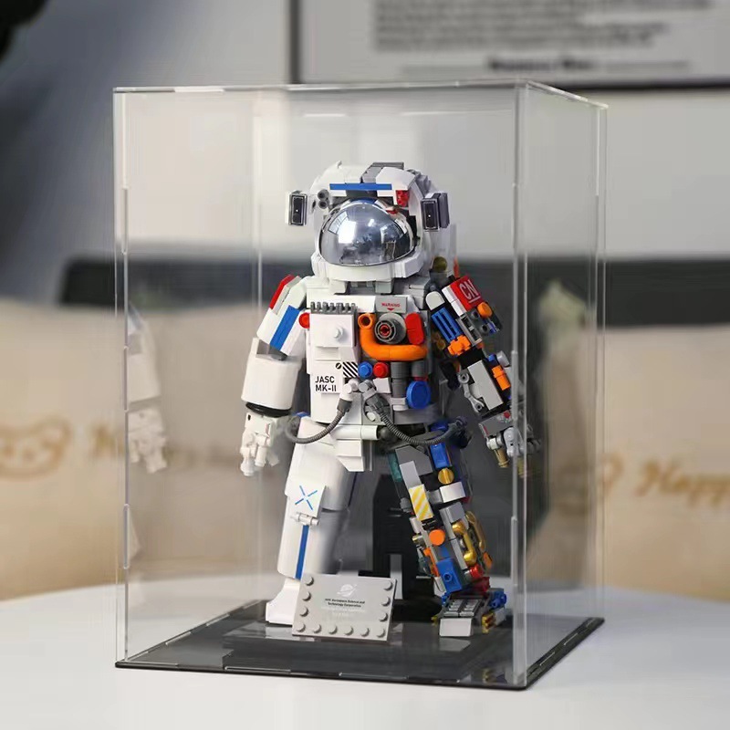 JAKI Jiaqi amanecer astronauta compatible Lego modelo de ladrillo niño desmontado astronauta chino regalo de decoración