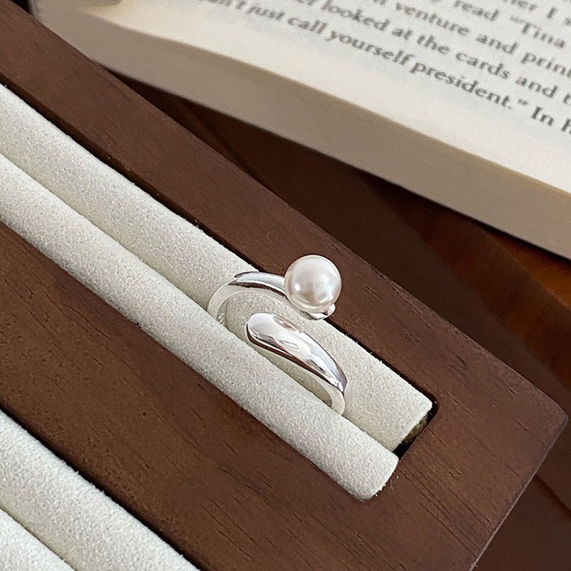 Minimalistische open ring met kruis parel en schelp dames_voghion.com