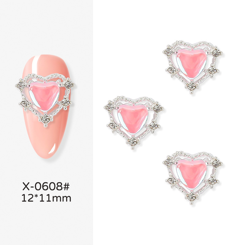 Nueva joyería de uñas Rojas netas Nueva Aurora en forma de corazón de diamantes de oro y plata Corazón de melocotón Diamante grande linda chica bonita yema de los dedos decoraciones