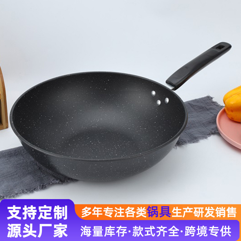 Suministro directo de fábrica de hierro wok hogar no recubierto sartén antiadherente Cocina de Inducción estufa de gas aplicable al por mayor