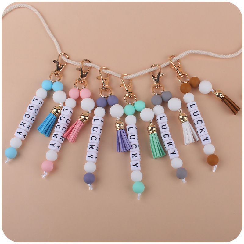 Nuevo creativo borla colgante DIY nombre llavero colgante de cuentas de silicona colgante bolsa colgante AliExpress
