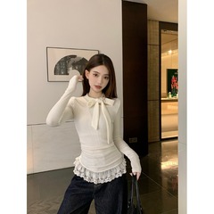 宋正恩の白い蝶結びの半高襟の長袖のtシャツの女性の秋冬の修身の中に底のシャツのレースの小さい上着を掛けます。