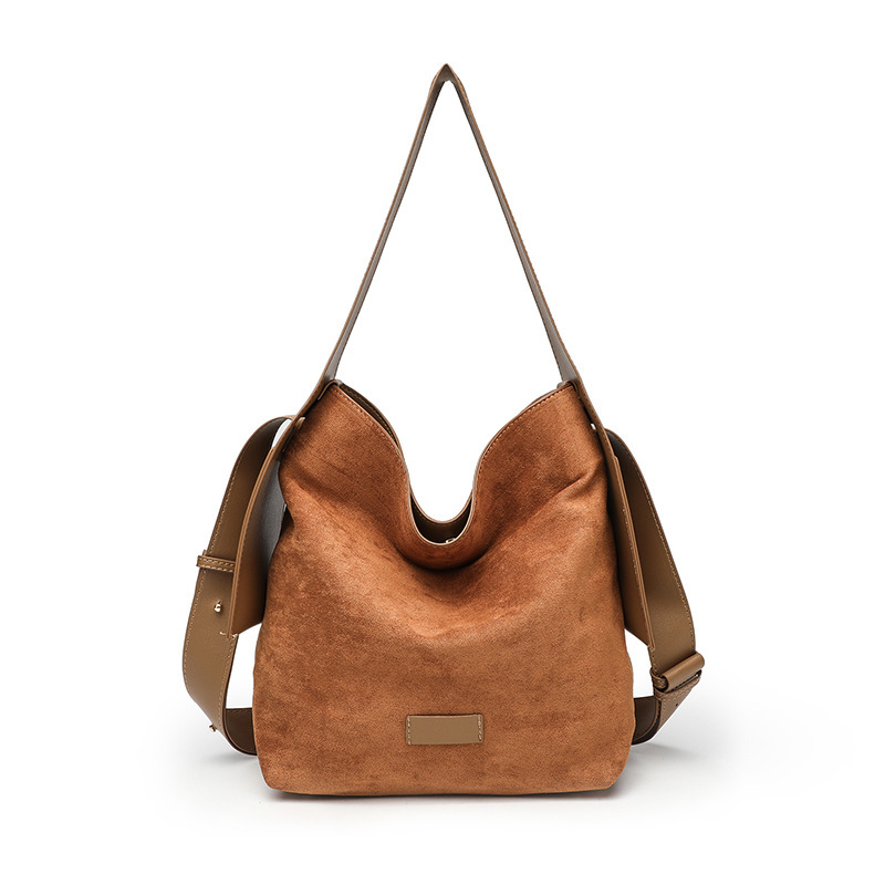 Bolso especial de orejas colgantes de songmont bolso de mujer grande y medio de cuero suave universal de un solo hombro bolso de mano