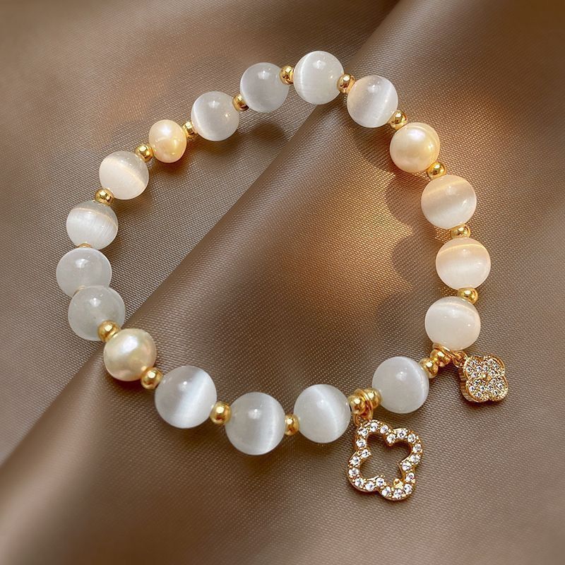 2025 New Cat's Eye Clover Crystal Bracelet Elastic Cord Shijia Niche Pearl Transfer Bracelet