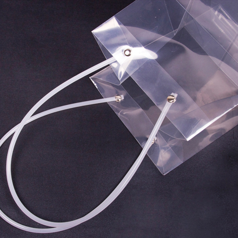 Yiwu fábrica en stock al por mayor material de embalaje de flores suculentas en maceta Bolso de Plástico de regalo bolsa de ramo de flores