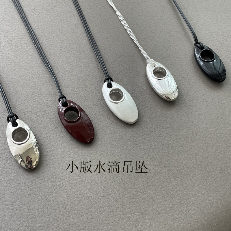 韓国のひまわりのオニーと同じ銀色のネックレスの長いタイプの水滴のペンダントはセーターのチェーンの新型を調節することができます。|undefined