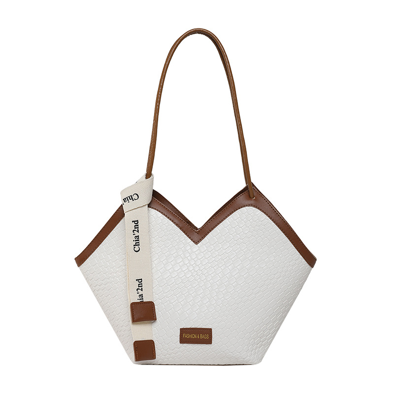 Bolsos de gran capacidad para mujer 2025 nuevo estilo retro patrón tejido bolso de axilas de un solo hombro textura de moda bolso de viaje