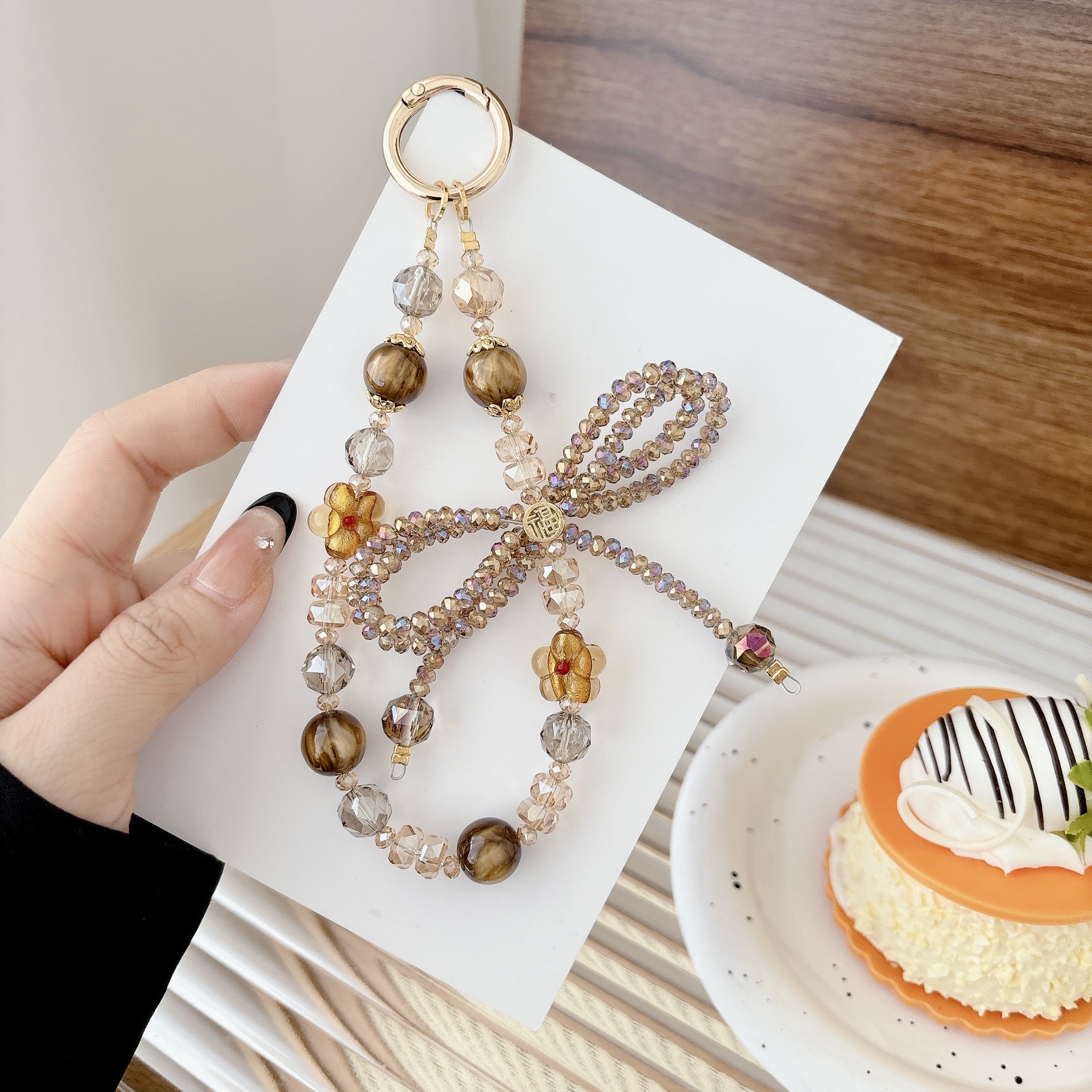 El arco de lujo ligero de lujo de alto nivel puede luchar, cadena de teléfono móvil, colgante de teléfono móvil, bolso, llavero, colgante, nicho de diseño