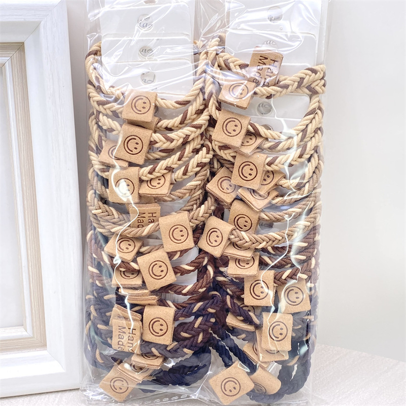 Descuento 4 tarjetas estilo coreano leche té color lindo paño etiqueta banda de pelo banda de goma de las mujeres del lazo del pelo cuerda de pelo 2 yuanes tienda accesorios