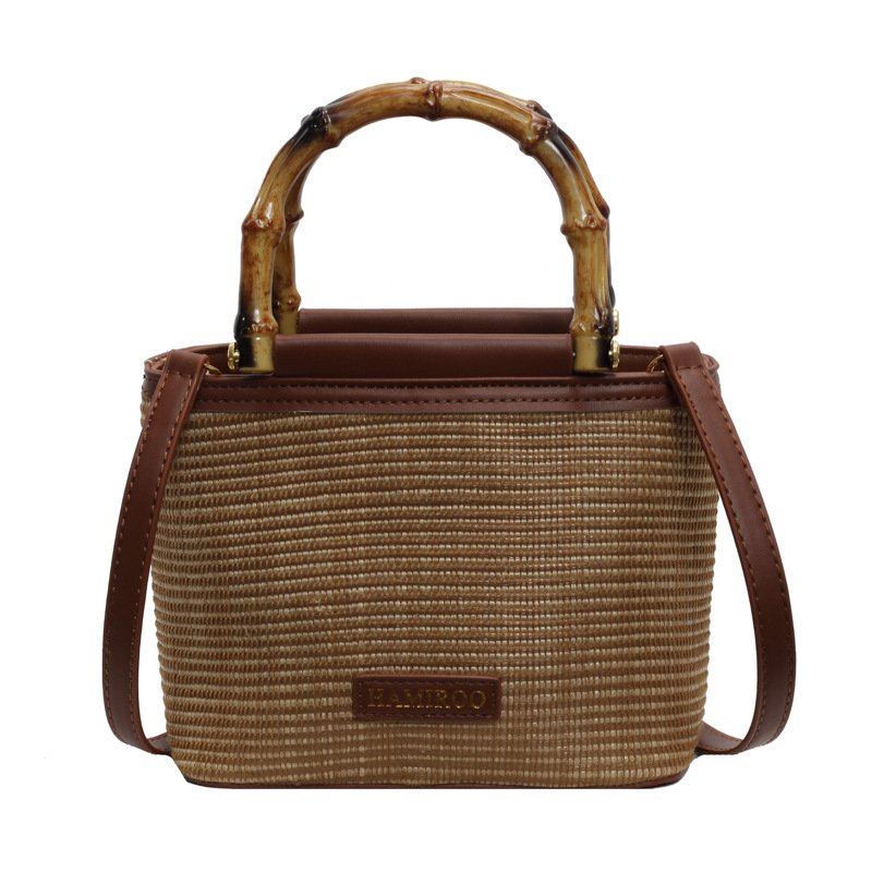 Bolso de mano de bambú para mujeres 2025 nuevo verano bolso de balde de vaquín coreano bolso de hombro mochila de moda