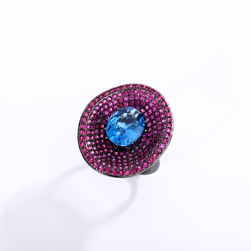 2024 Zhuang Shengsheng Jewelry Fondo de cobre chapado en oro simulación corindón rojo cristal puntiagudo azul anillo de personalidad mujer spot 10*12