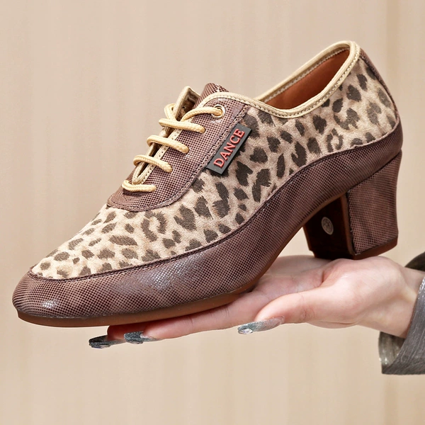 Dark-skinned leopard print female teacher