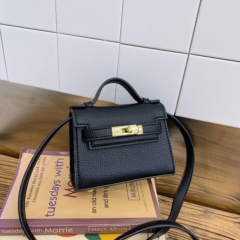 Bolso de hombro para niños y niñas de estilo coreano mini bolso de mensajero para padres e hijos de color sólido simple nuevo monedero con cerradura para niños