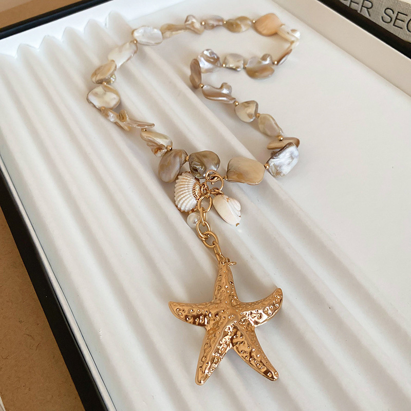 Collar de perlas de estrella de mar con cuentas de estilo de vacaciones junto al mar, nueva cadena de clavícula transfronteriza, joyería de lujo ligera de alta gama de nicho para mujer