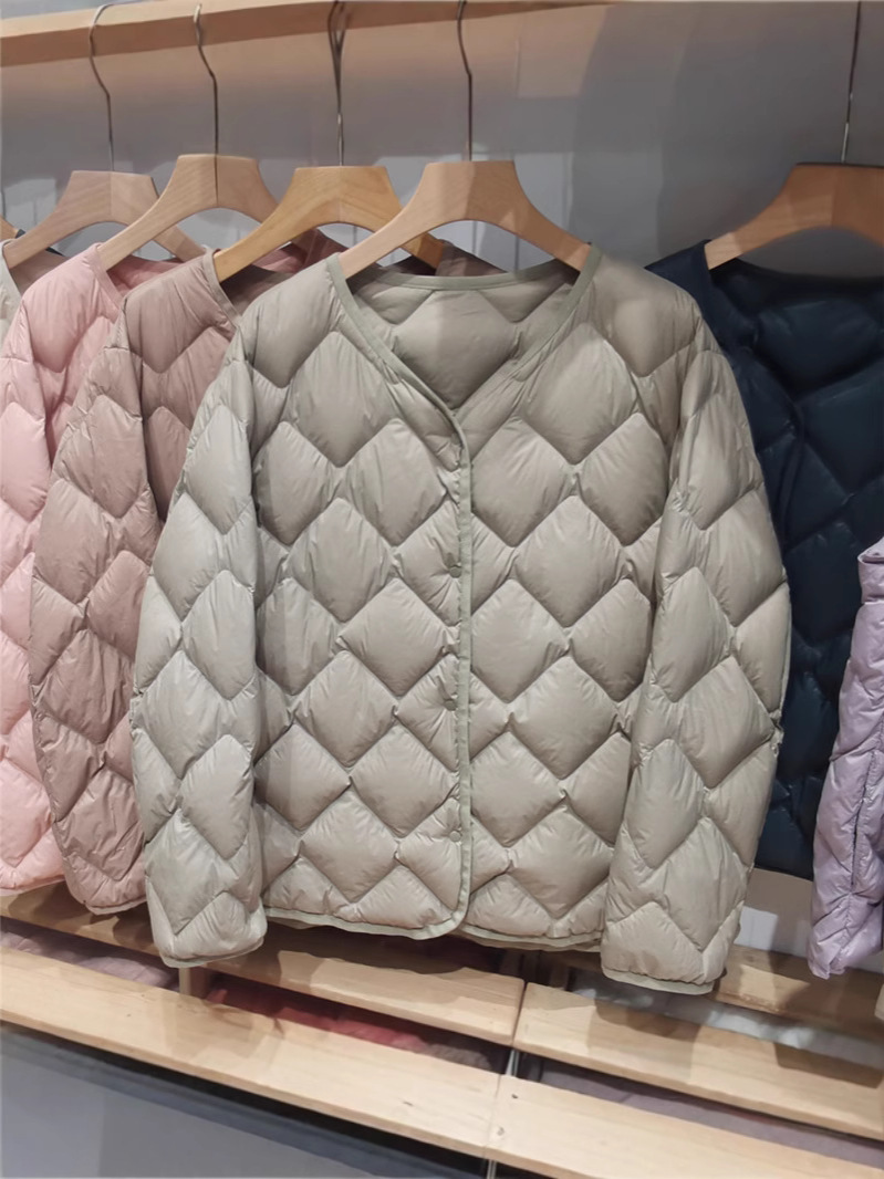 Transfronterizo Tik Tok nuevo chaqueta de plumón de alta calidad mujer corta ligera delgada plumón revestimiento de cuello redondo chaqueta casual
