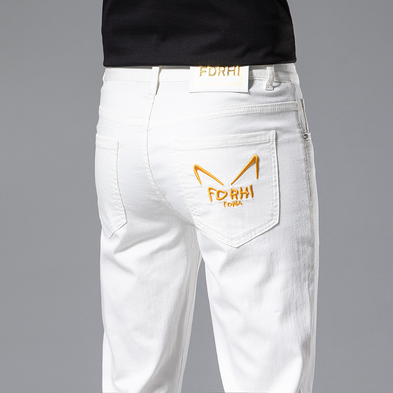 Jeans alla moda da uomo sottili primavera/estate Pantaloni con piedi elastici in cotone bianco slim fit ricamati di marca di fascia alta_voghion.com