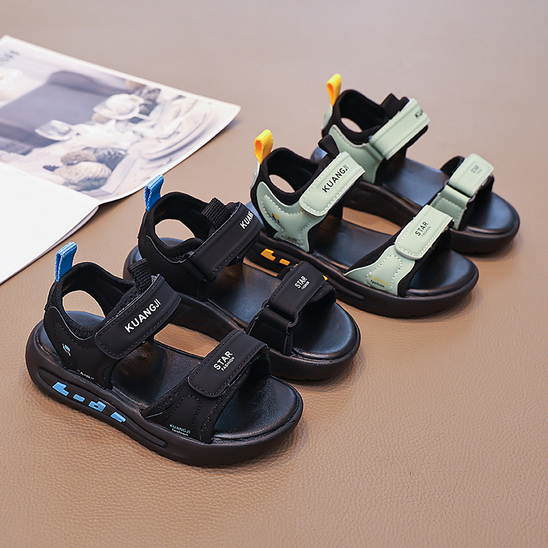 Niños huecos zapatos de playa de dedo abierto 2026 verano nuevo estilo de moda infantil sandalias versátiles sandalias de niños mayores