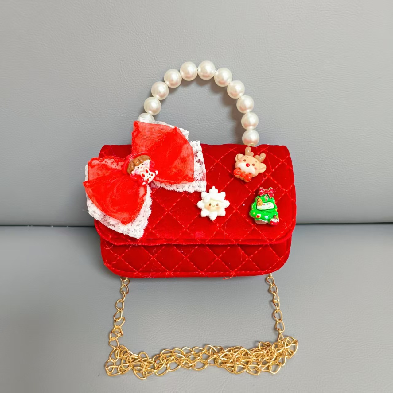 Cartera de Año Nuevo rojo arco de papá Noel bolso de perla pequeña cadena de viento fragante bolso de hombro