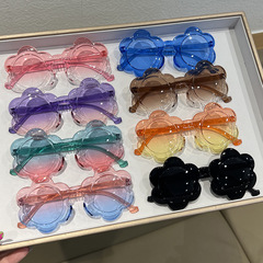 新款一体片彩色儿童太阳镜圆框跨境小孩眼镜防晒宝宝太阳花墨镜