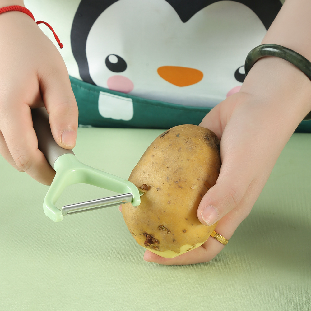 Household melon stainless steel peeling knife Fruit plane kitchen…