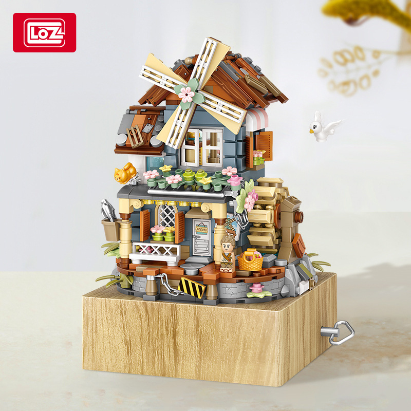 Caja de música de Navidad senbao bloques de construcción de cristal árbol de Navidad creativo juguetes educativos ensamblados regalos de vacaciones al por mayor y al por menor