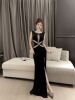 Sexy dress design with a high waisted slit long skirt