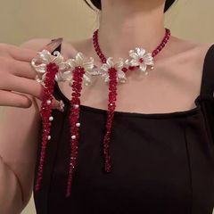 レトロなアイリスレッドビーズネックレス女性のための 2025 新しいニッチ個性誇張ハイエンドタッセル鎖骨チェーン