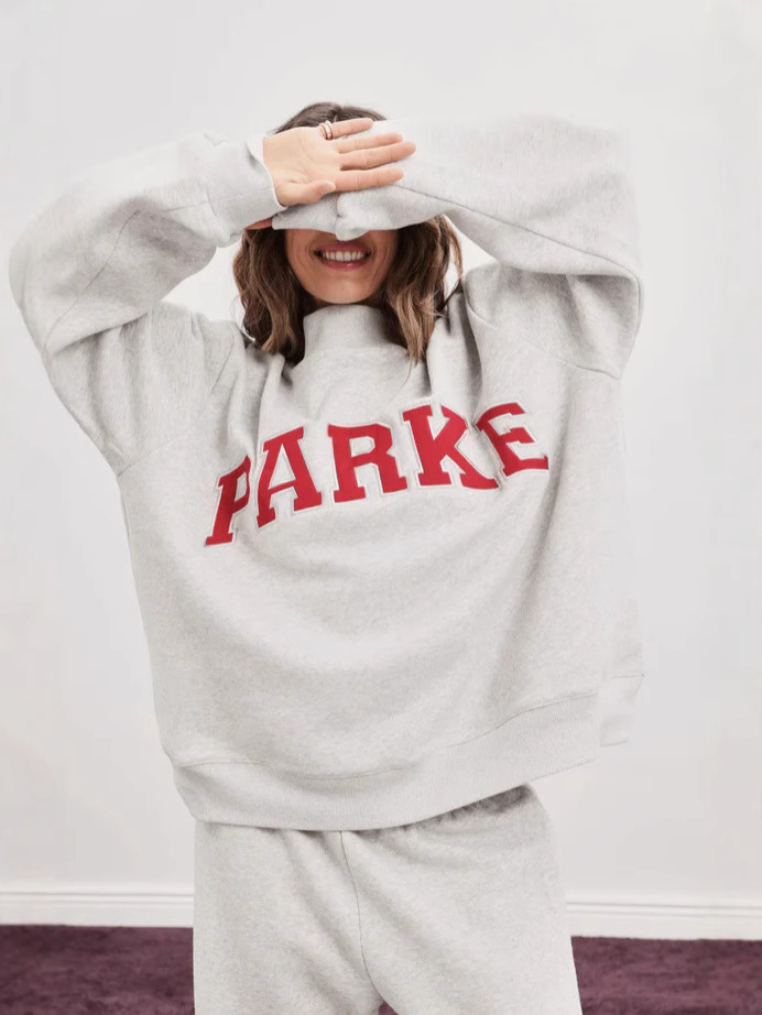 Light gray turtleneck-red letters