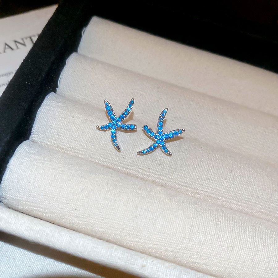 Aguja de plata, circón, estrella de mar azul, pendientes de temperamento ins coreanos, pendientes de todo fósforo de moda femenina, sentido de diseño, nicho