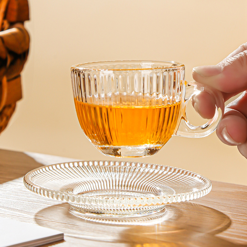 Juego de tazas y platillos de café de vidrio transfronterizo Taza de café con leche americana Taza de té transparente resistente al calor Taza de café de lujo europea
