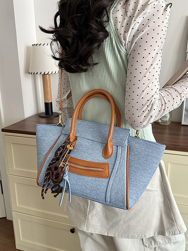 Bolso para mujeres 2026 comercio exterior nuevo bolso de mano de gran capacidad de alta calidad color contraste commuting cara sonriente bolso de mochila