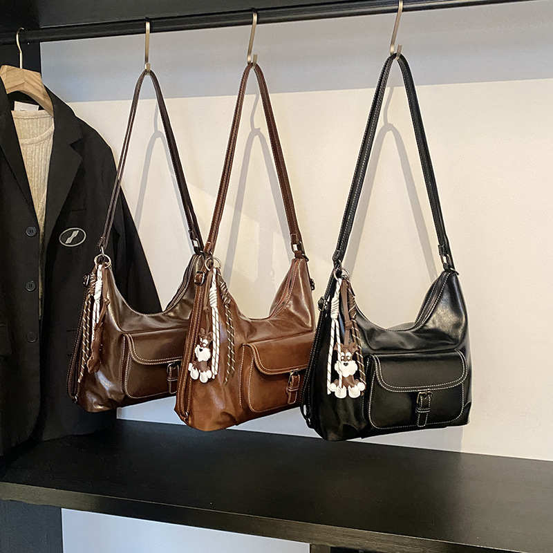 Vintage Maillard brazalete, mochila de mujer, invierno 2024 nuevo estilo simple de hombro de gran capacidad.