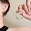 25 # Silver multi-layered cross-twisted circle about 4cm