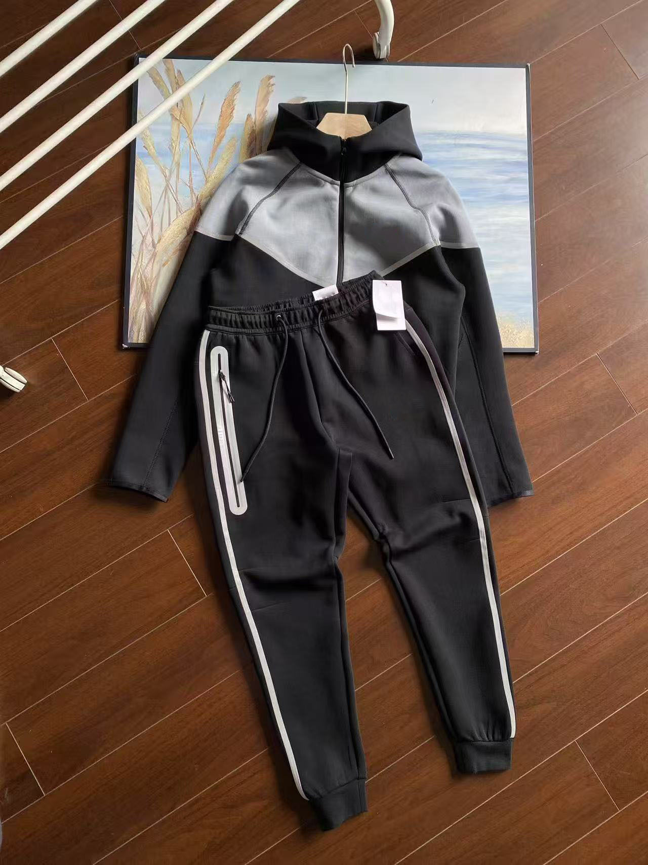 25 años de nuevo chaqueta deportiva encapuchada chaqueta de aire capa de algodón chaqueta con cremallera chaqueta de estampado reflectante otoño conjunto de chaqueta