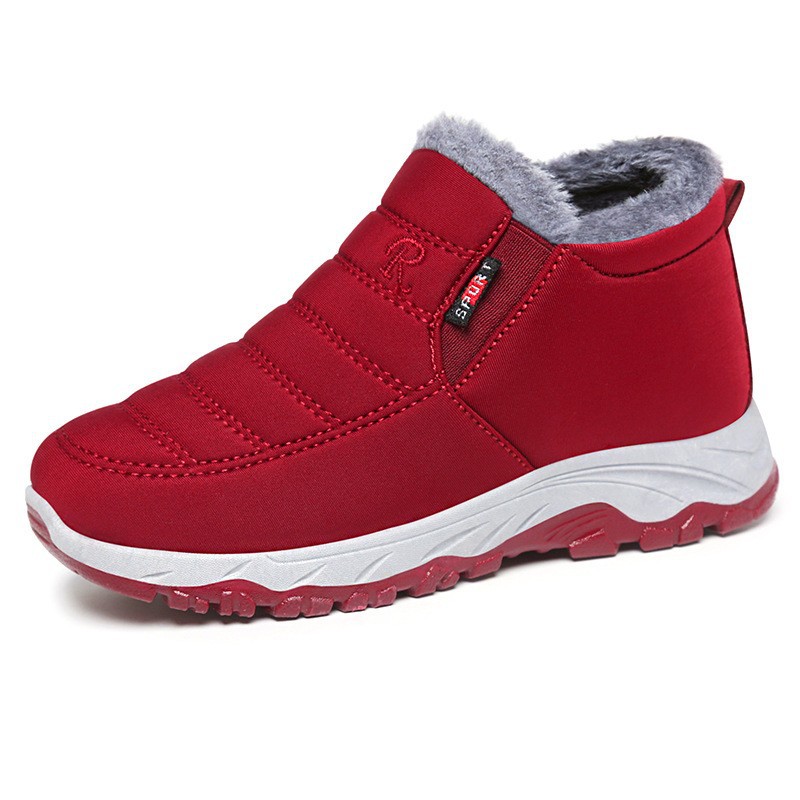 Botas de algodón de invierno de mujer procesamiento personalizado fuente de fábrica botas de mujer más espesa pareja botas de algodón grande al por mayor