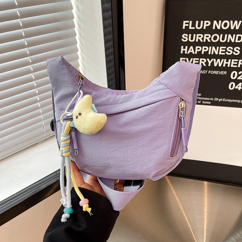Bolsa de hombro deportiva casual coreana para hombres y mujeres, bolsas de bolsas de bolsas para niños de color sólido.