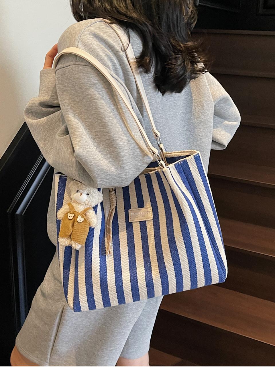 Bolso de lona para mujer de gran capacidad 2025 nuevo bolso de hombro a cuadros de todo fósforo moda casual bolso de alta gama de estilo coreano