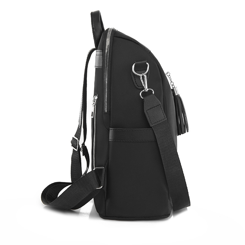 2023 otoño nuevas señoras casuales mochila de tela Oxford borla de moda mochila pequeña multifuncional mochila escolar al por mayor