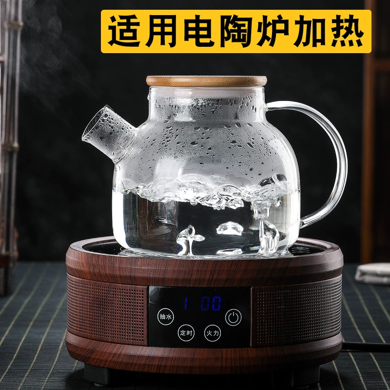 Glass capacious transparent teapot