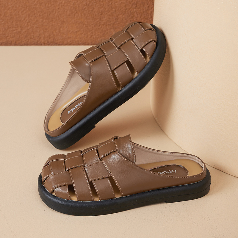 Zapatillas de fondo plano de la antigua mujer 2026 nuevo paquete de primavera con un pedazo de tela exterior sandalias romanas huecas