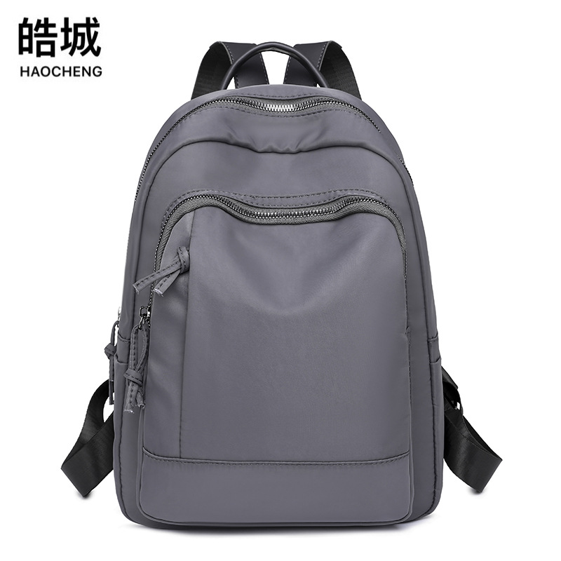 Fuente de origen 2023 nueva mochila Oxford para mujer coreana, mochila de viaje al aire libre de moda simple y versátil