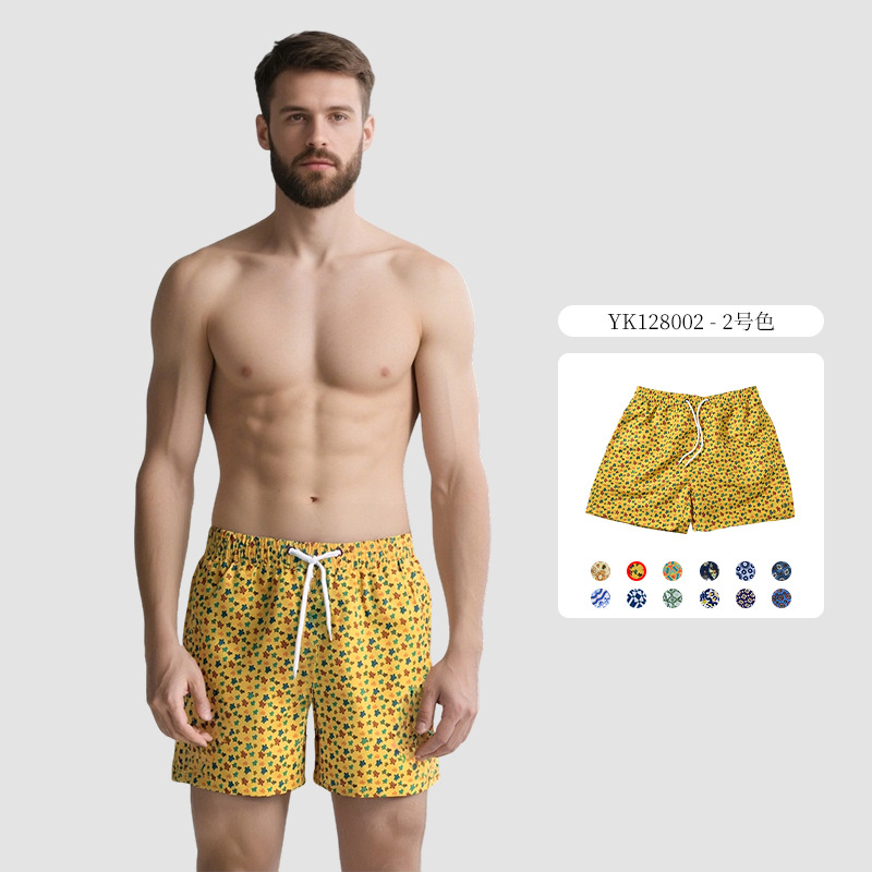 Pantalones de cuatro puntos florales de piel de melocotón para hombre, bañador casual de playa de tamaño europeo, forro de secado rápido, pantalones de playa de vacaciones junto al mar