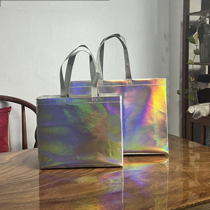 Fabricante spot engrosamiento colorido láser laminada ropa bolso no tejido compras bolsa de regalo de alta gama impresión logotipo