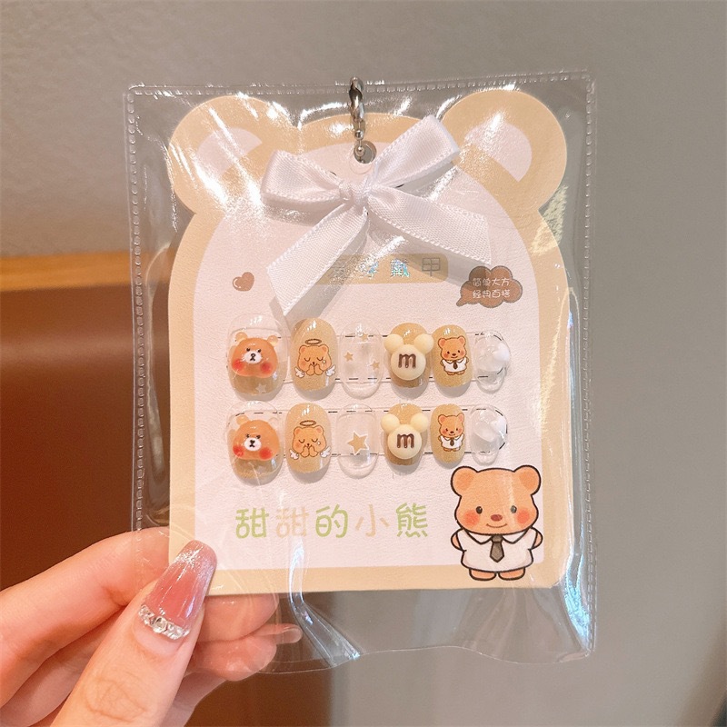 Uñas postizas Kuromi para niños en caja, lindas pegatinas de uñas removibles para niñas, pegatinas de uñas exquisitas de dibujos animados.